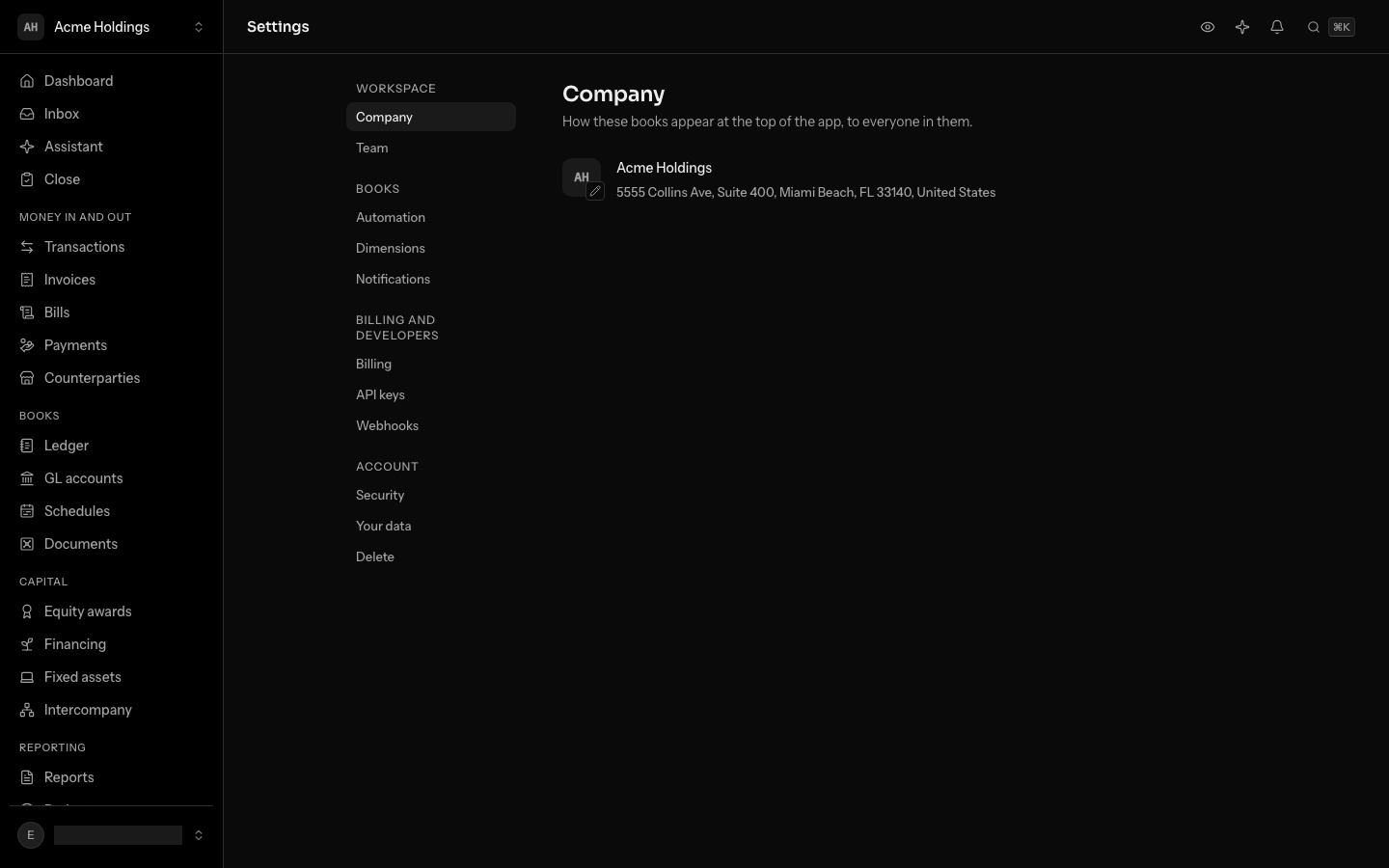 Settings, under Company: the logo with a pencil at its corner, the name Acme Holdings, and the address in grey under it