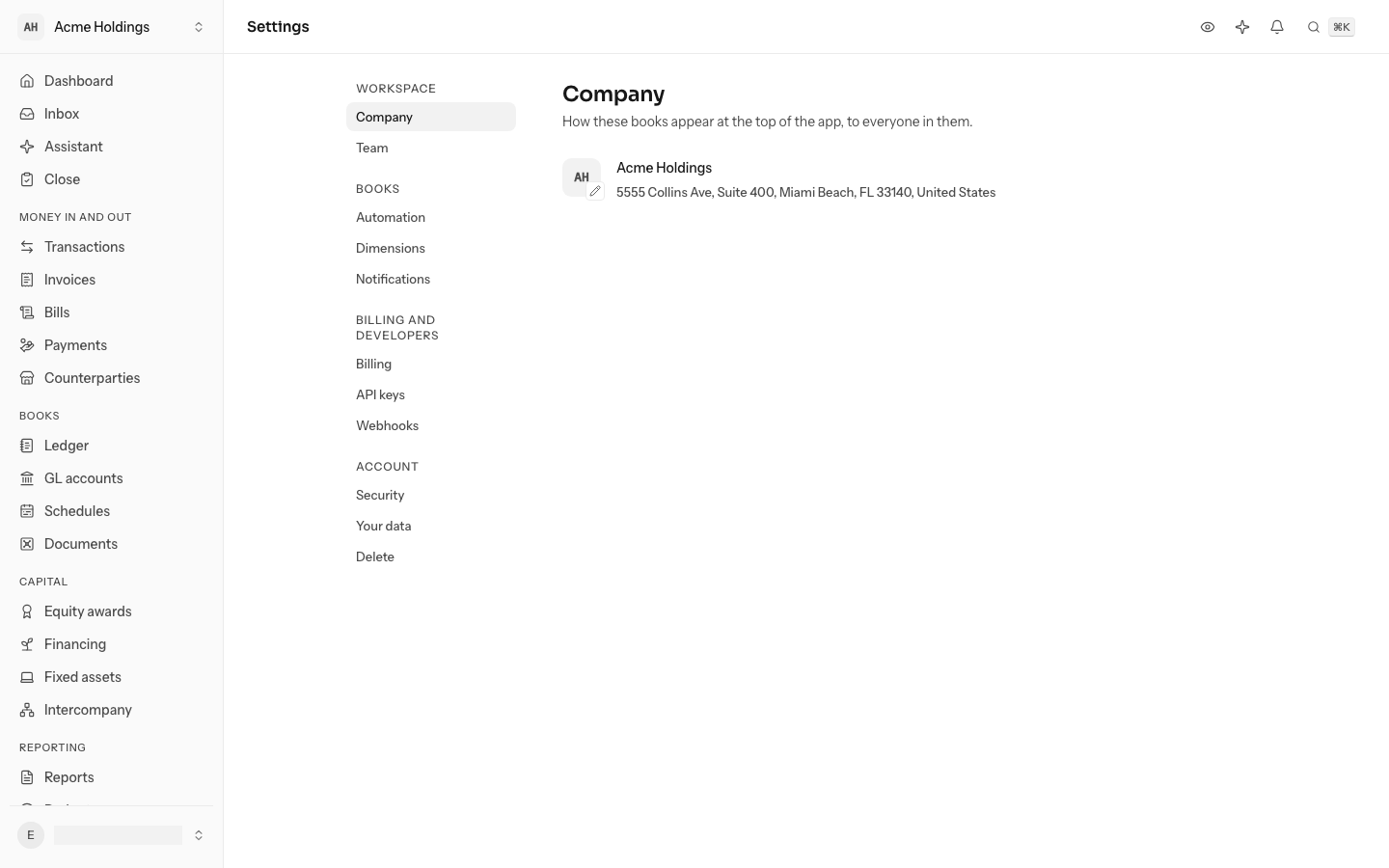 Settings, under Company: the logo with a pencil at its corner, the name Acme Holdings, and the address in grey under it